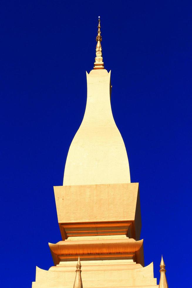 Beautiful great golden Pagoda at Wat Pha That Luang Temple at Vientiane province, Laos photo