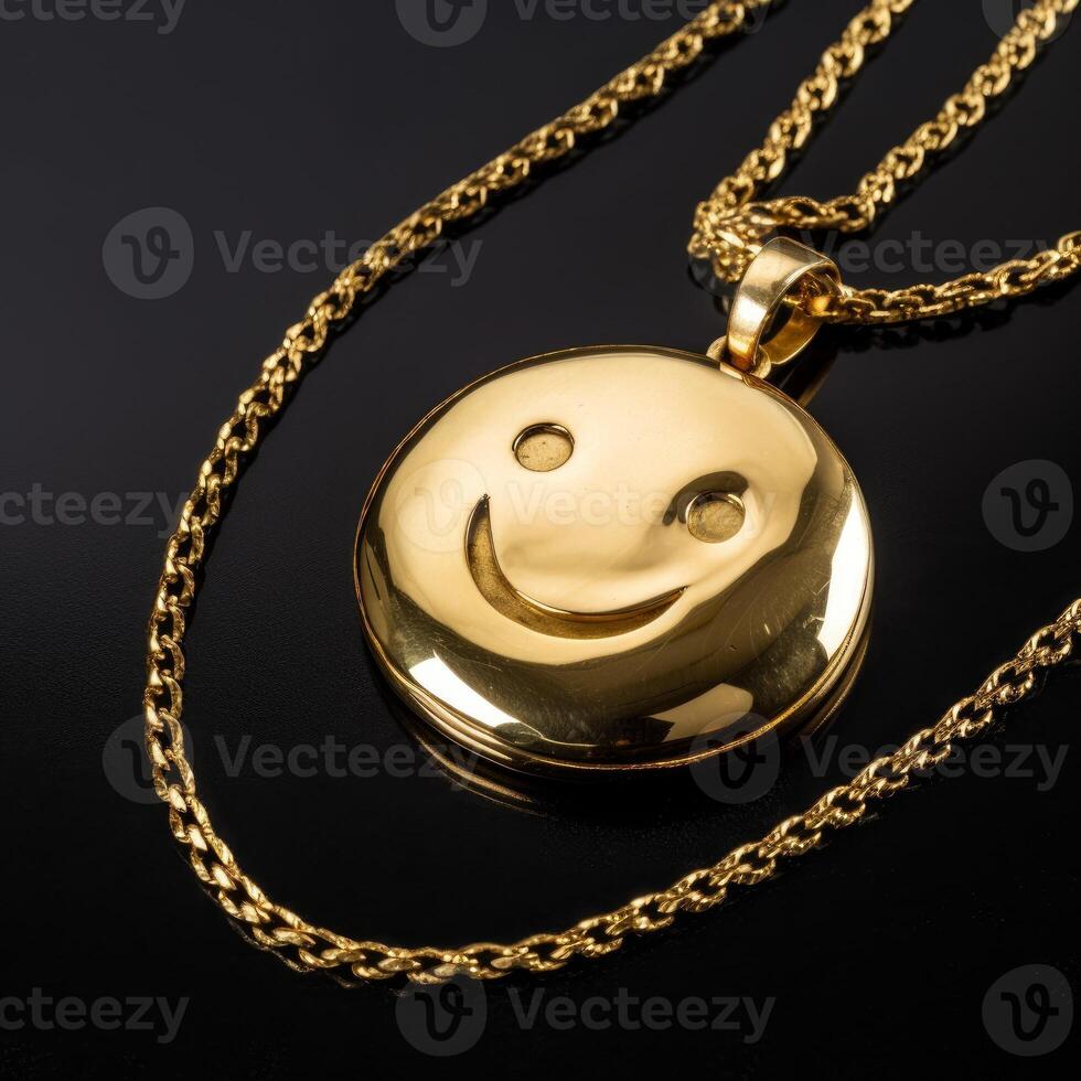 necklace 24k gold with a round smiley face on black background photo