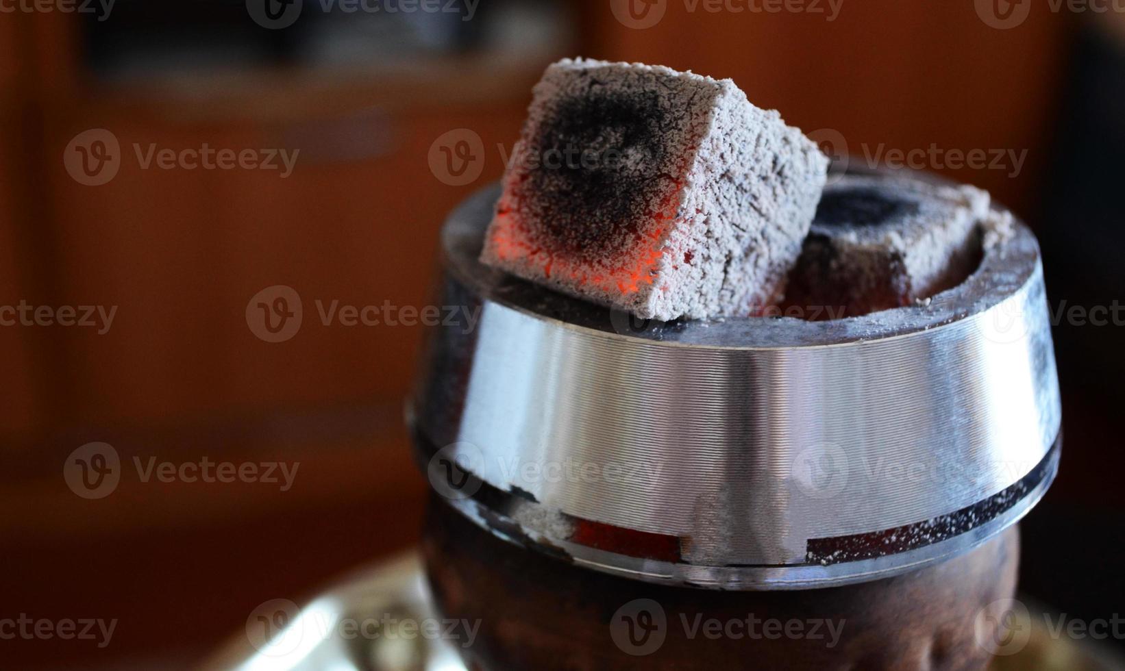 hookah smoking, hot coals for hookah in callaud, coconut charcoal, hookah accessories, close-up photo