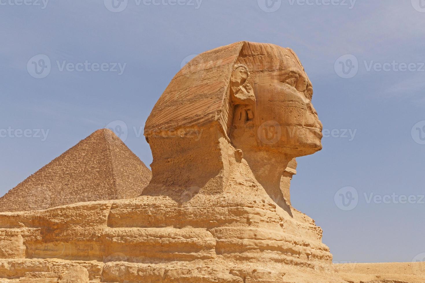 Great Pyramid behind Great Sphinx of Giza photo