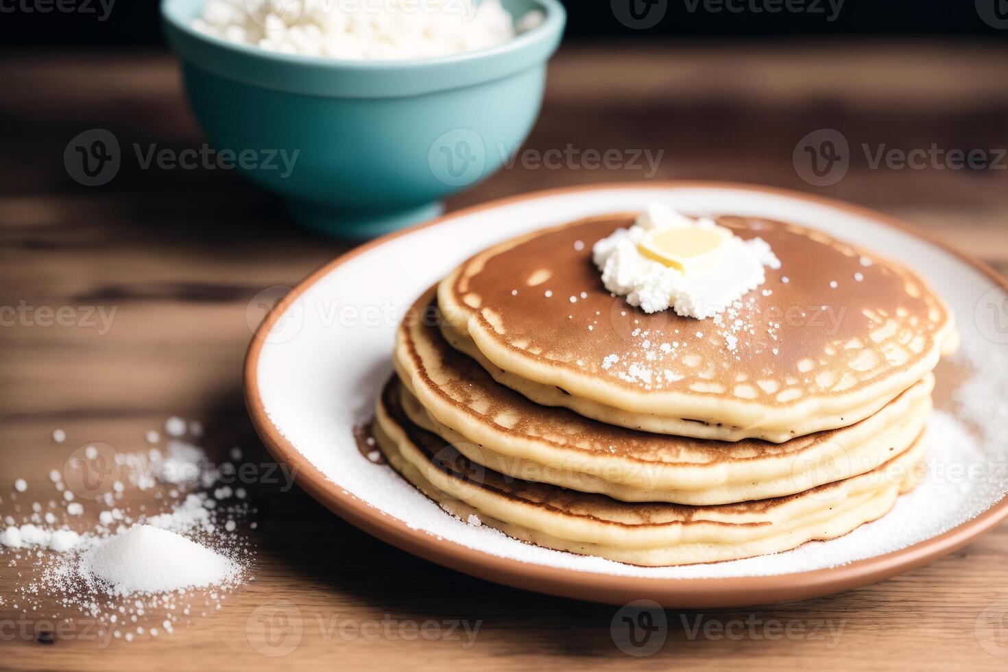 Stack of pancakes with maple syrup and sugar powder on a white plate. strawberries and whipped cream, photo