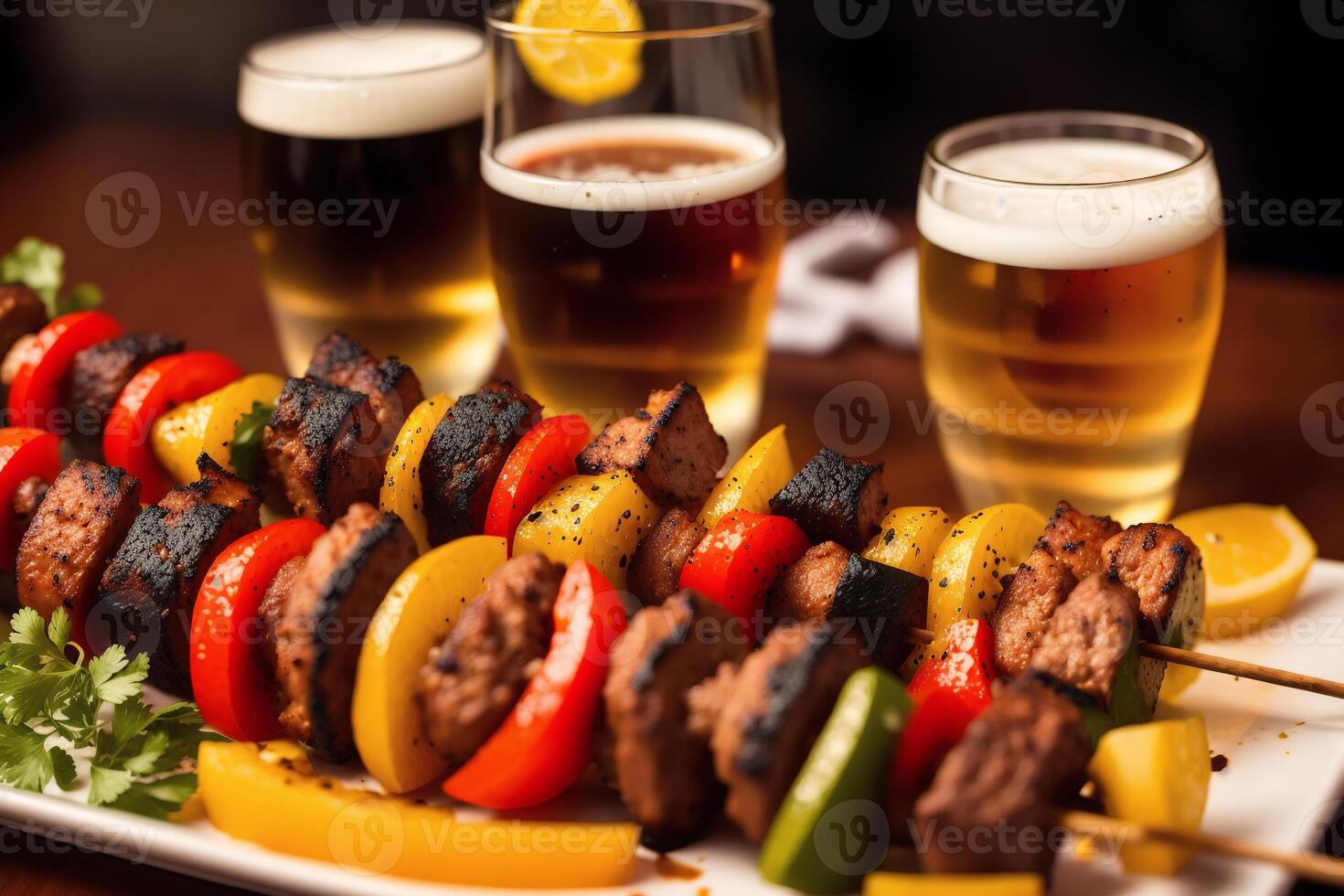 A plate with shish kabob on a wooden table. Meat sticks. photo