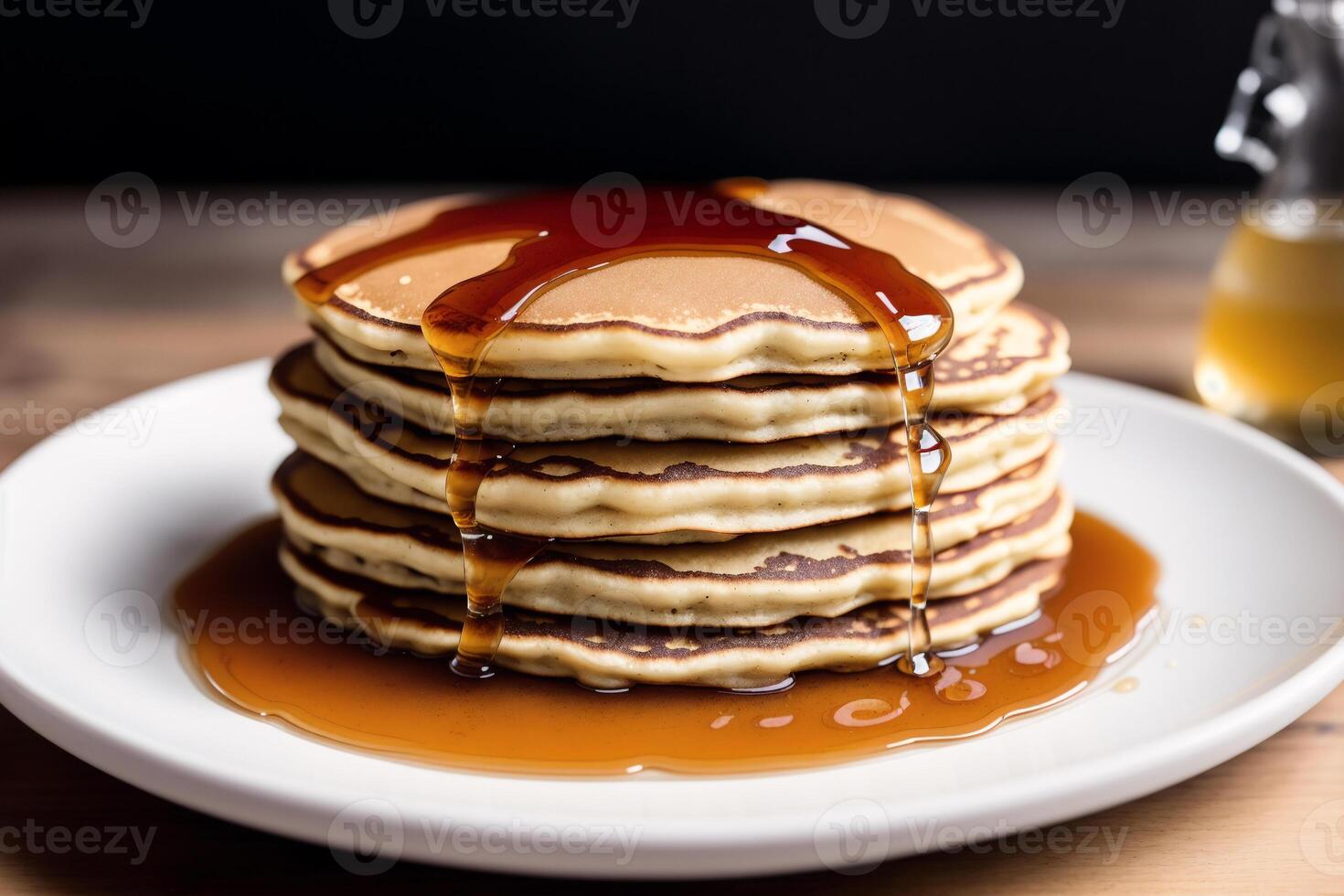 Stack of pancakes with maple syrup and sugar powder on a white plate. strawberries and whipped cream, photo