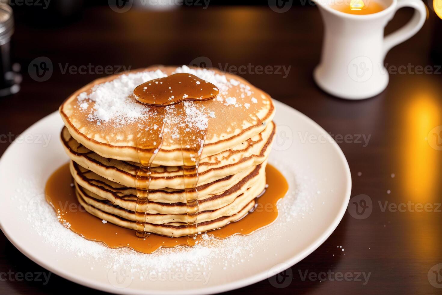 Stack of pancakes with maple syrup and sugar powder on a white plate. strawberries and whipped cream, photo