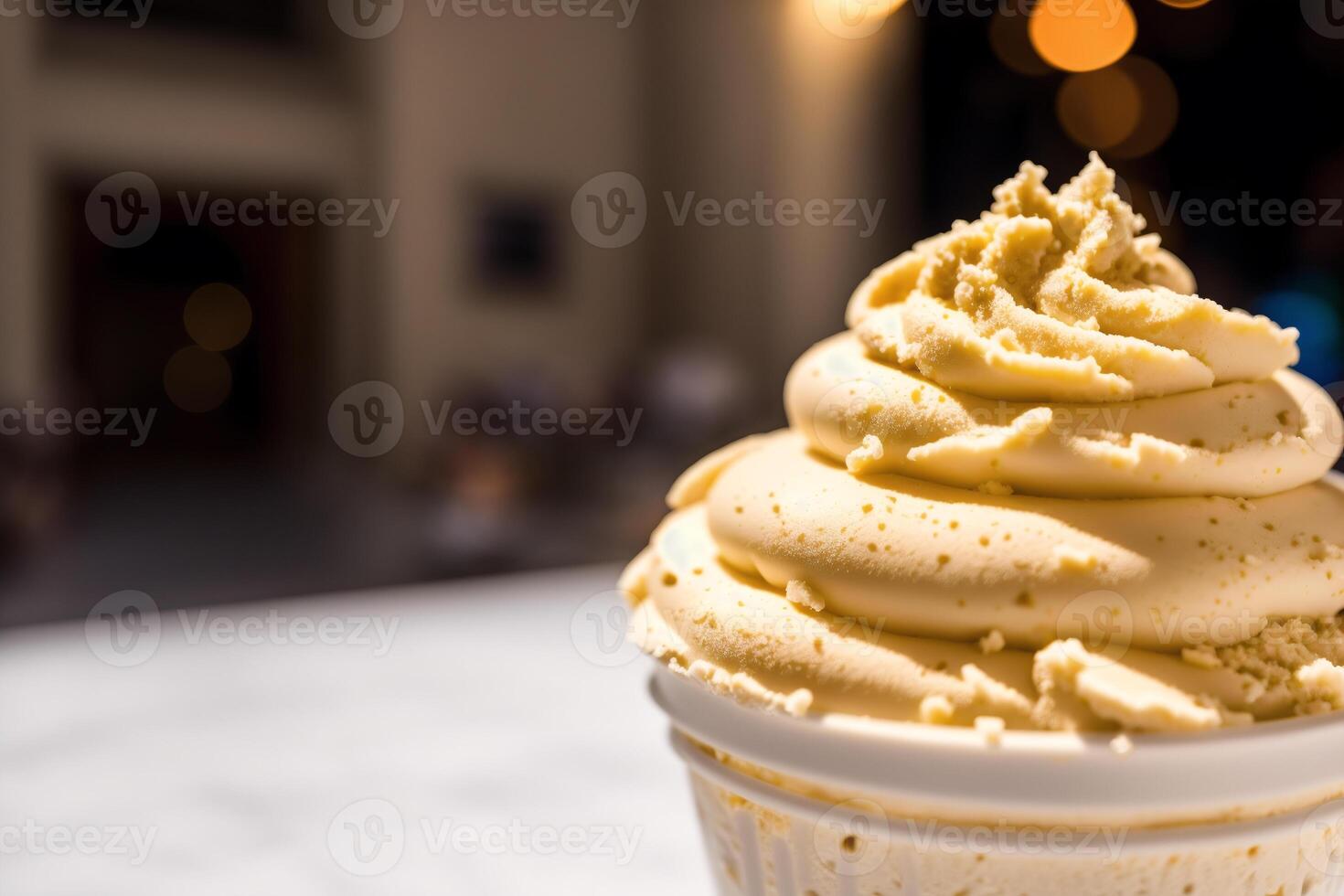 delicious ice cream in a cup, close-up, on the table. sweet food. photo