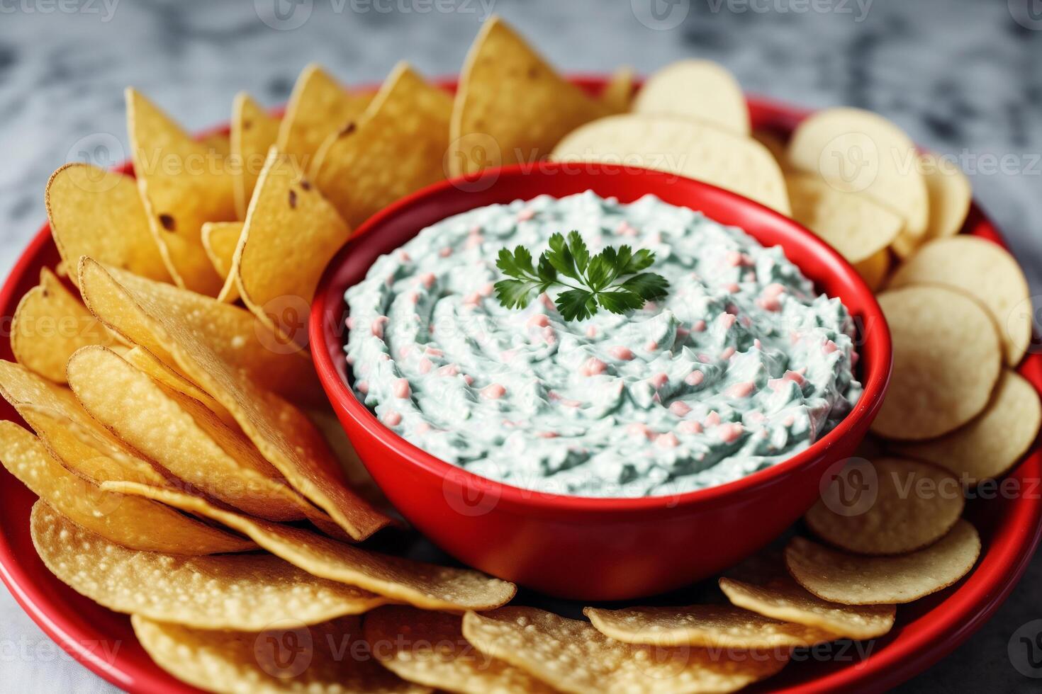 Potato chips in a bowl on a wooden background. photo