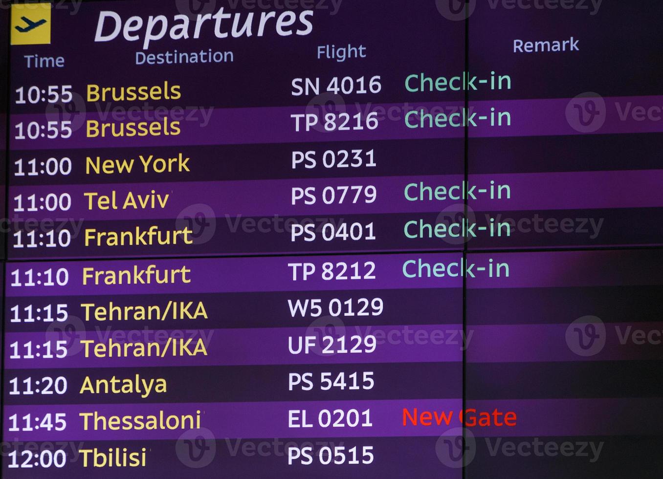 list of departures in airport photo