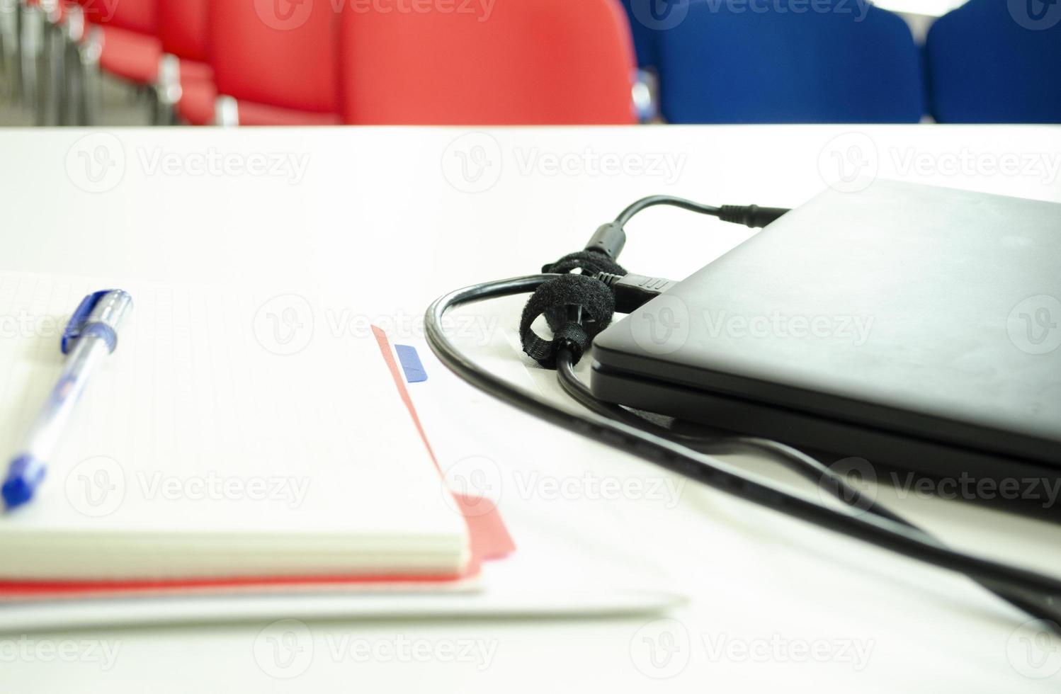 Before a conference. Preparing a report. Notebook closeup. Business and studying. photo