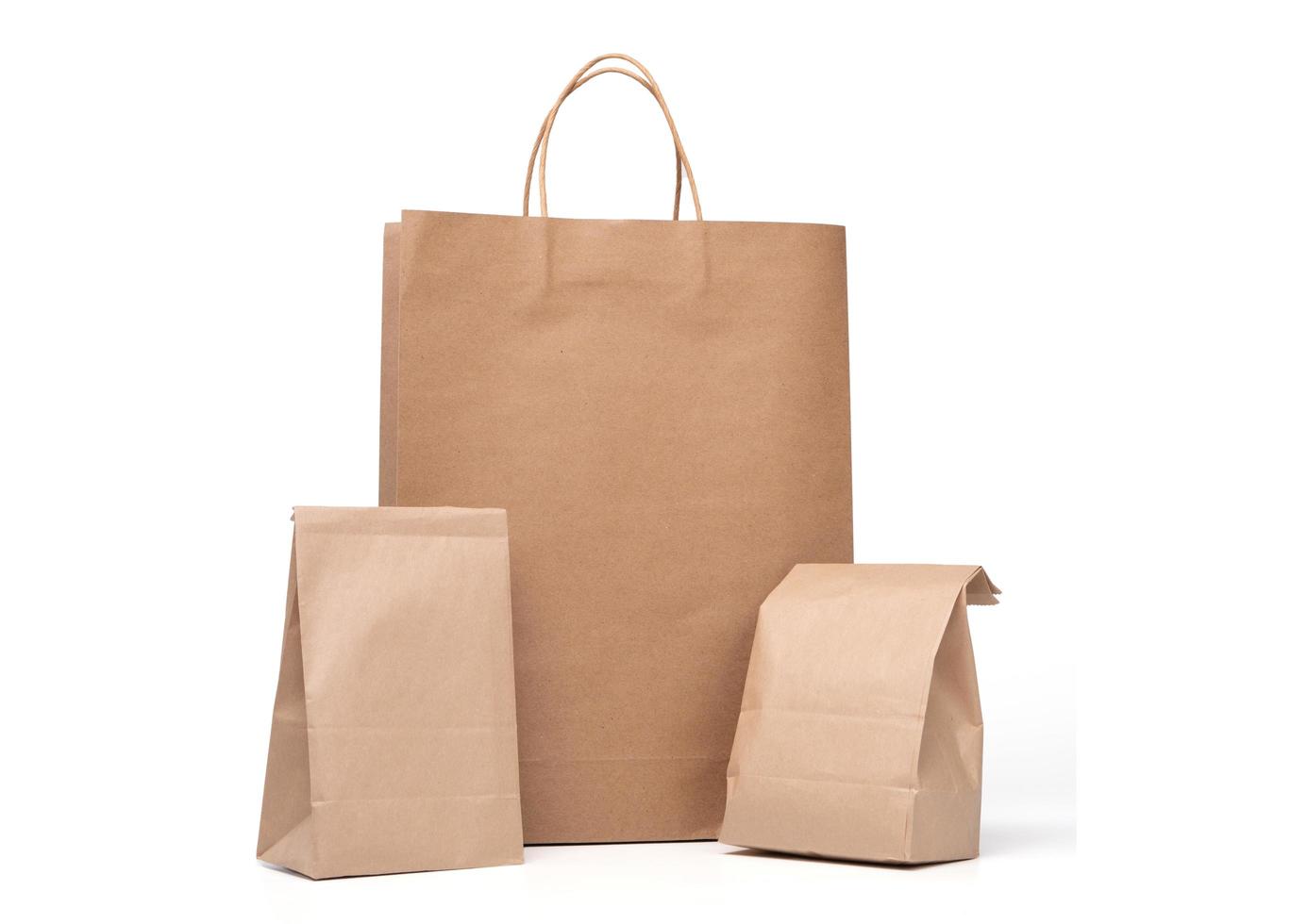 Group of lunch Paper bag and shopping paper bags isolated on a white background photo