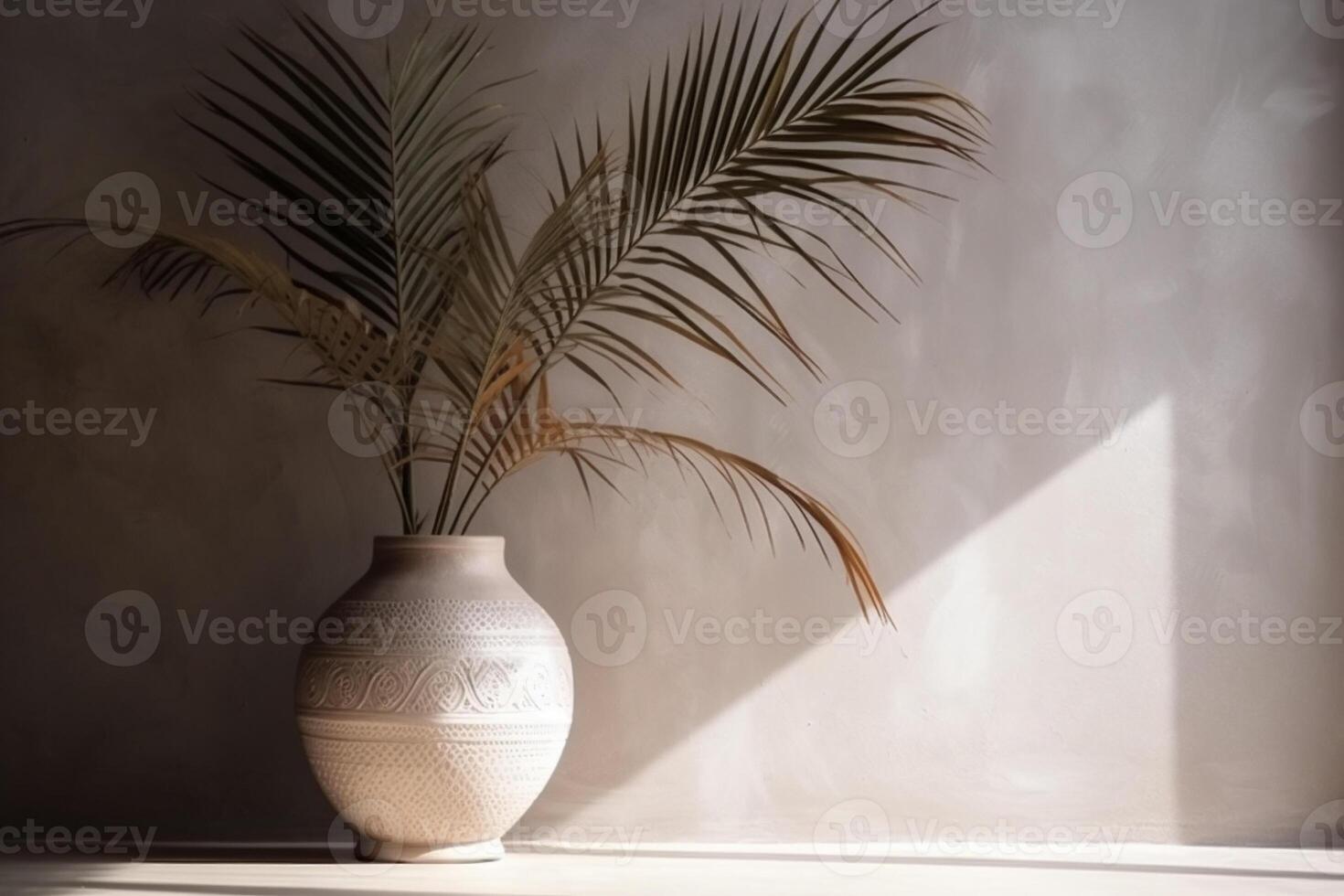 indoor view with pot and palm leaves photo