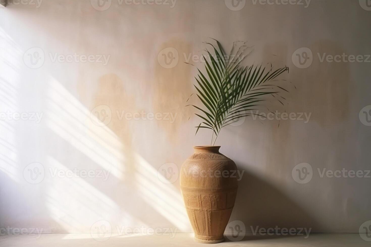 indoor view with pot and palm leaves photo