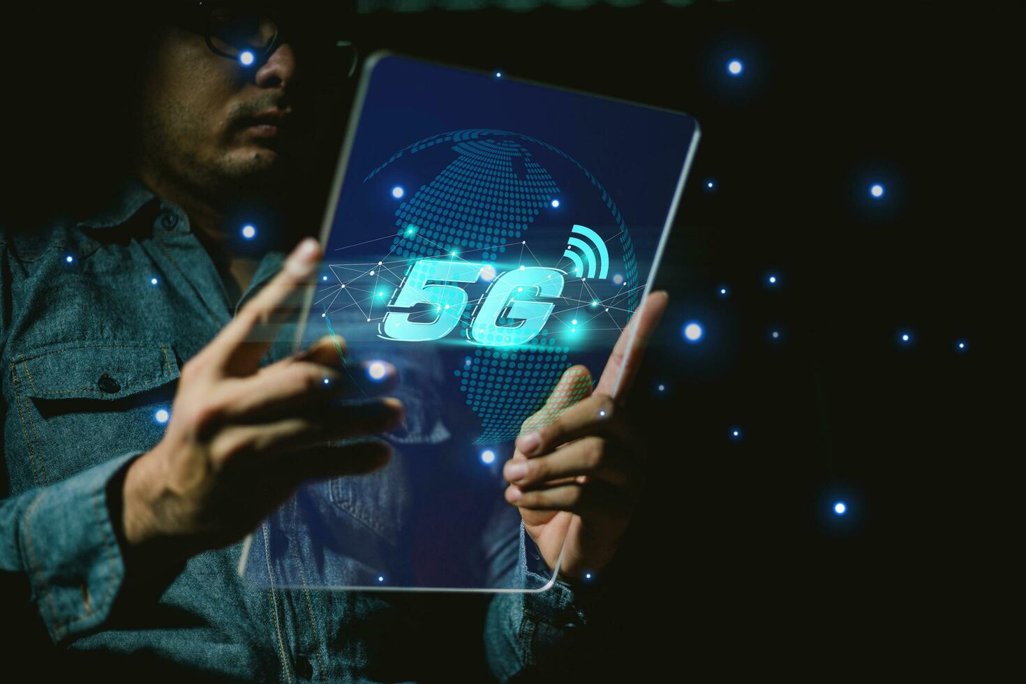 5G and internet of things or IOT concept, Hand touching virtual 5G signal. IOT is high technology which every device will connect and control by 5G high speed internet. photo