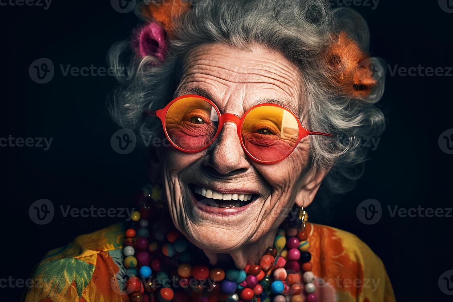 Portrait of an old smiling grandmother wearing sunglasses. The youth of the soul. photo