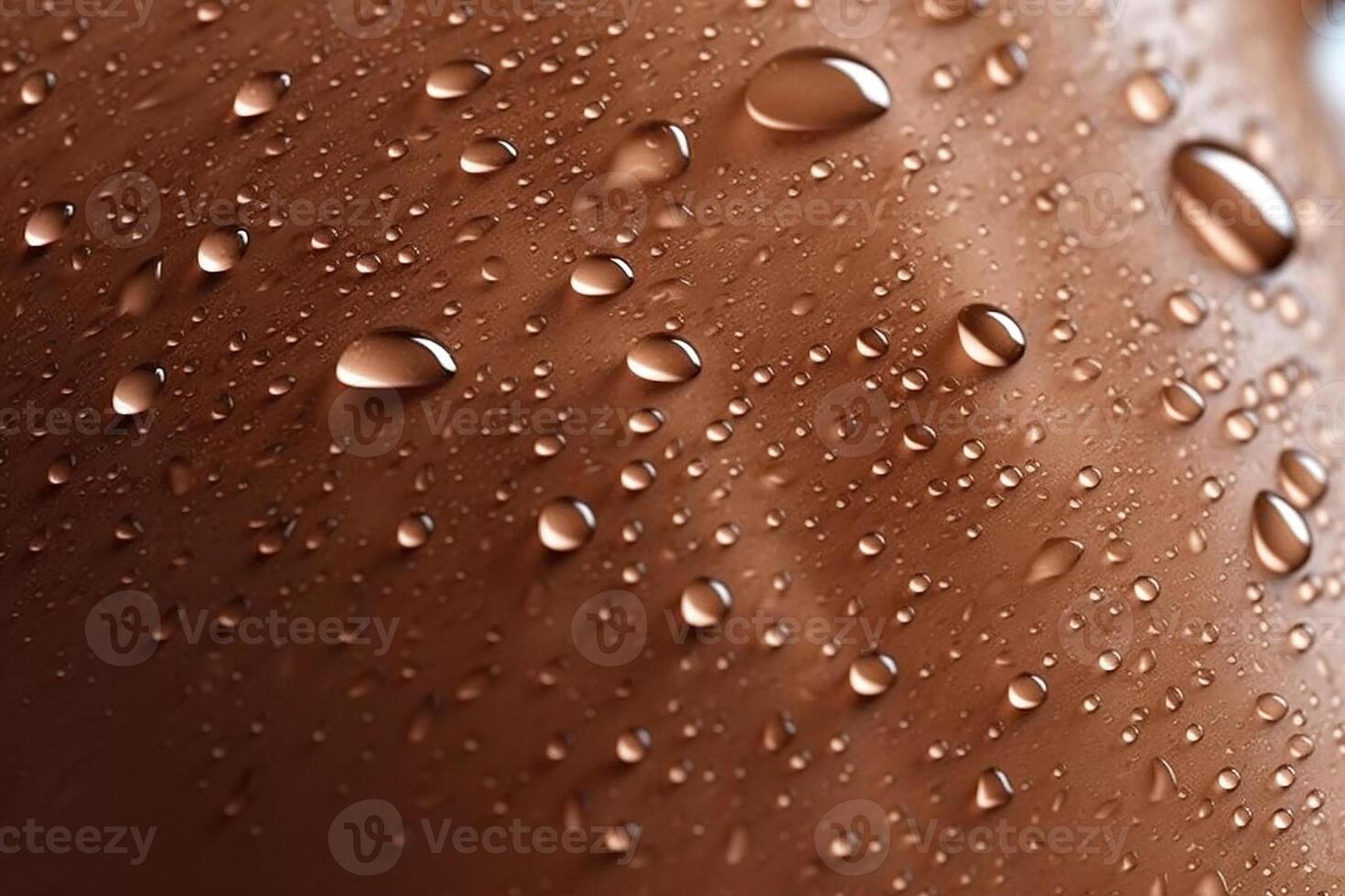 Drops of water on a woman's tanned skin. Background. photo