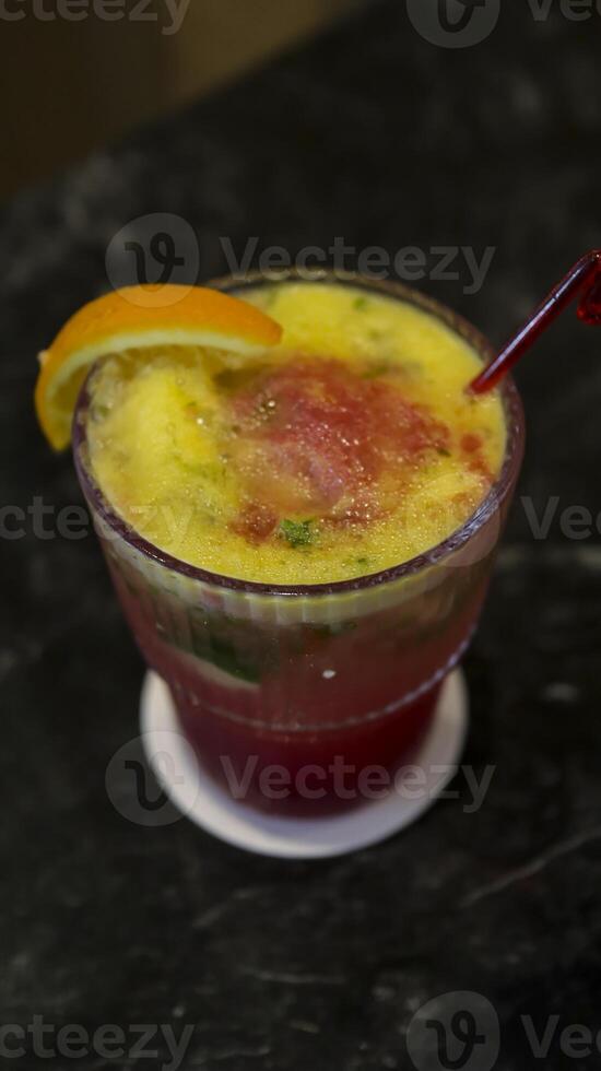 Virgin Strawberry mojito mocktail consist of soda water, strawberries, lime juice, sugar, mint leaves. photo