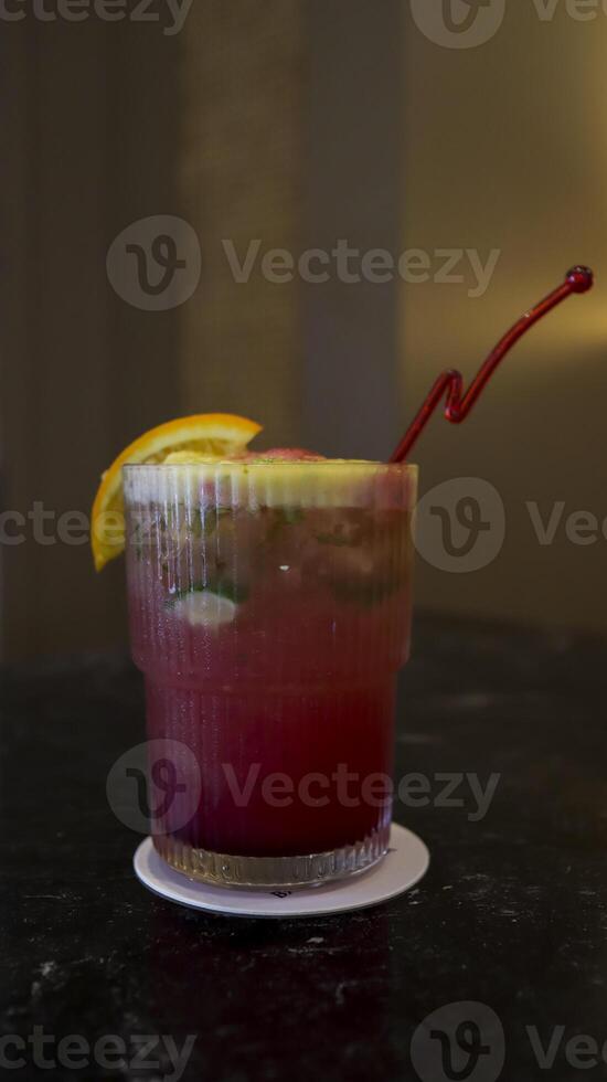 Virgin Strawberry mojito mocktail consist of soda water, strawberries, lime juice, sugar, mint leaves. photo