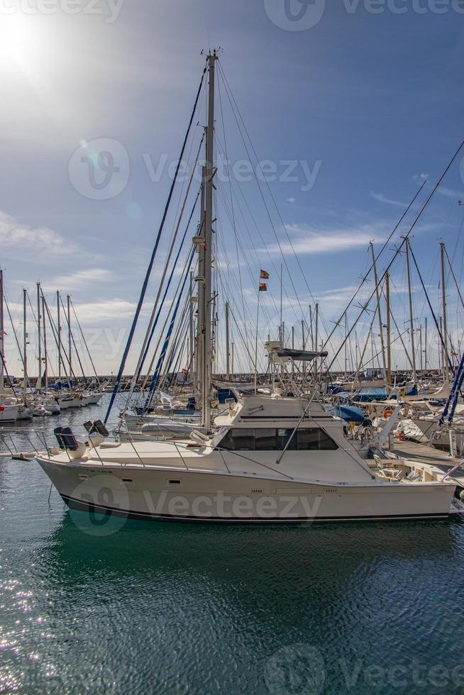 landscape with a port with yachts in the Spanish city of Puerto Rico on the Canary Island of Gran Canaria photo