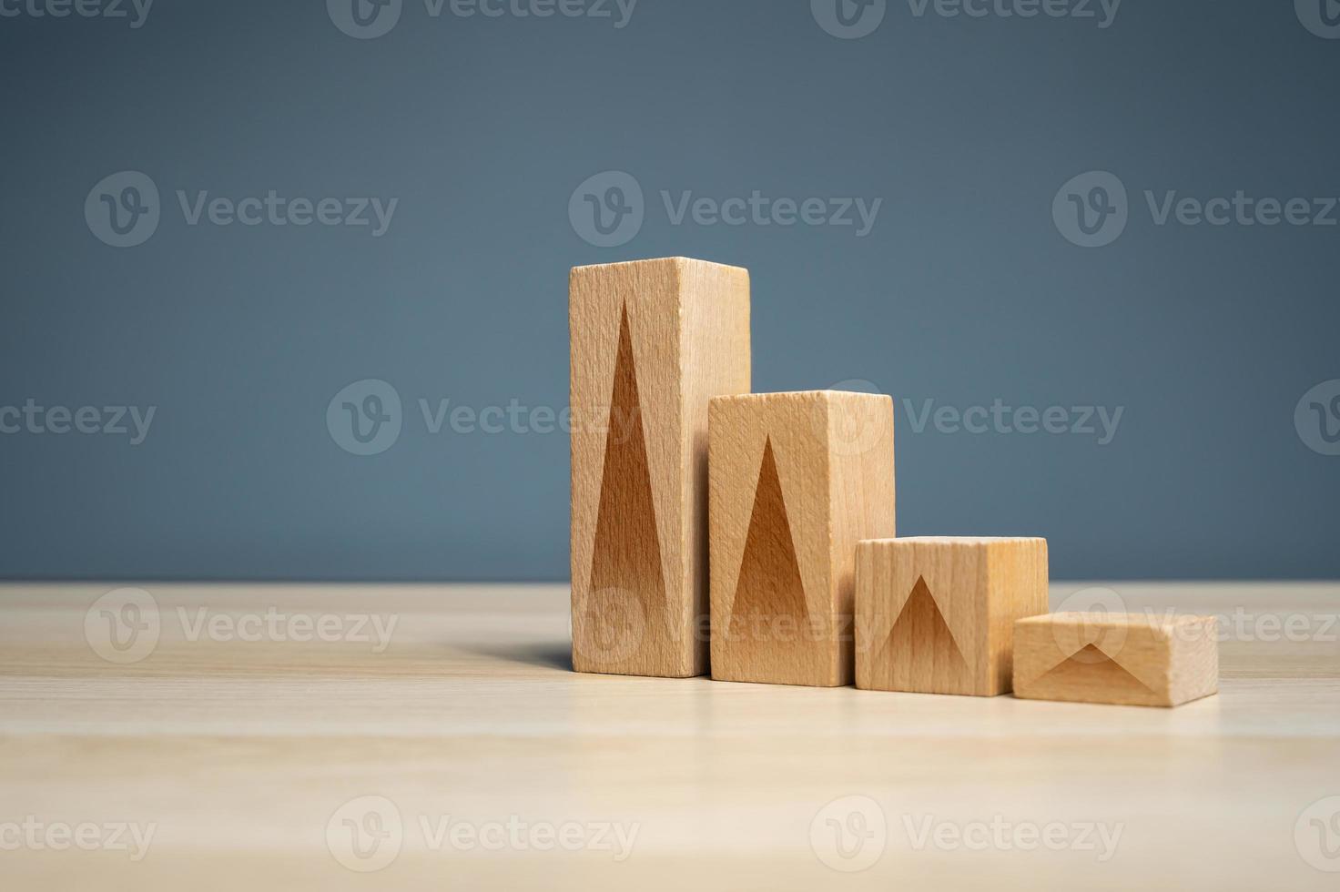 Growth chart from blocks with arrows. Rise or fall concept. Follow the trend. Development and evaluation of success. Heights and achievement in business and economy. Progress photo