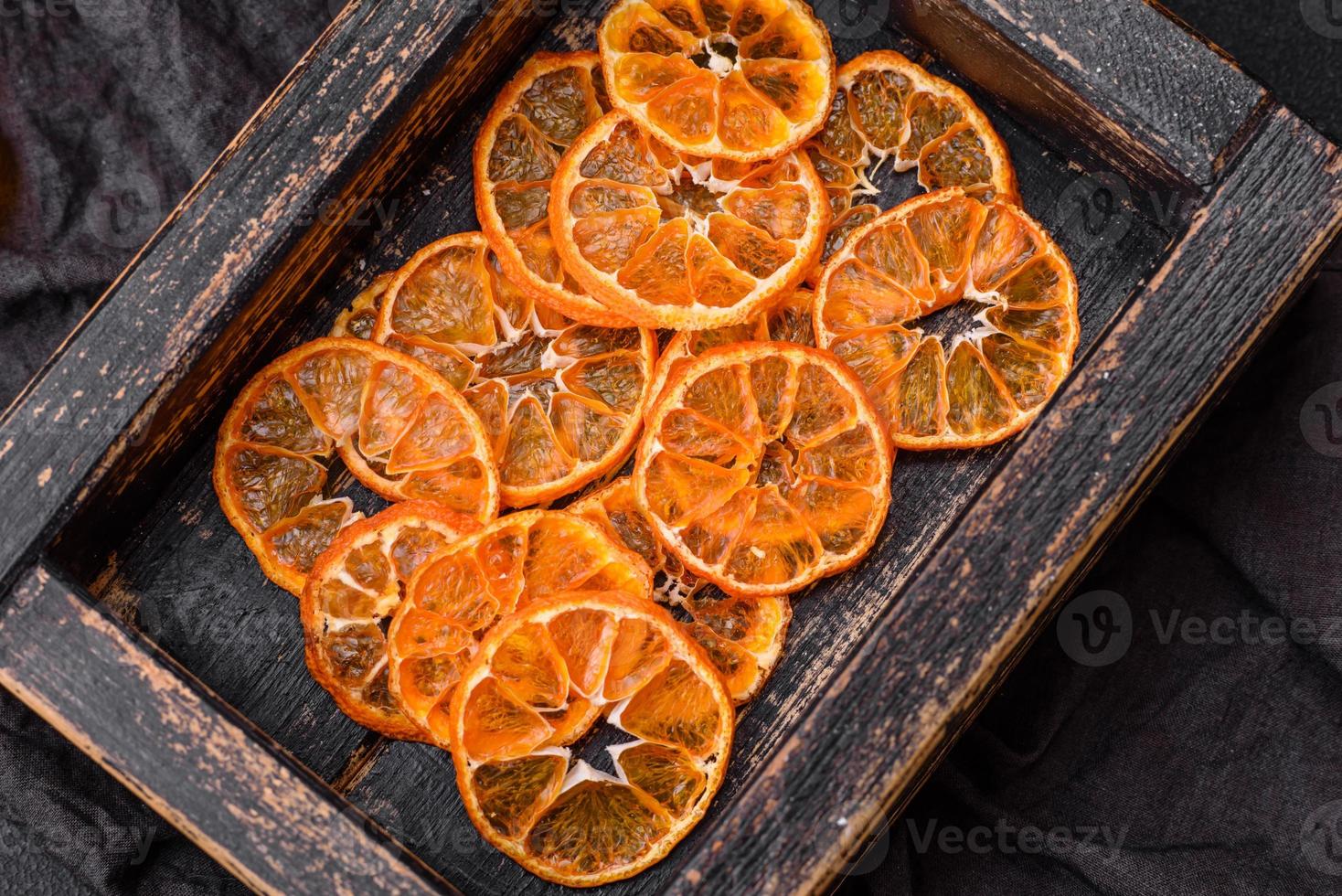 Beautiful Christmas decoration consisting of an old wooden box with dried citrus fruits photo