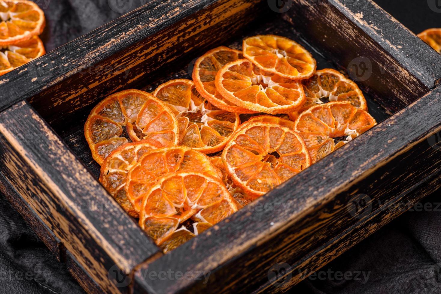 Beautiful Christmas decoration consisting of an old wooden box with dried citrus fruits photo