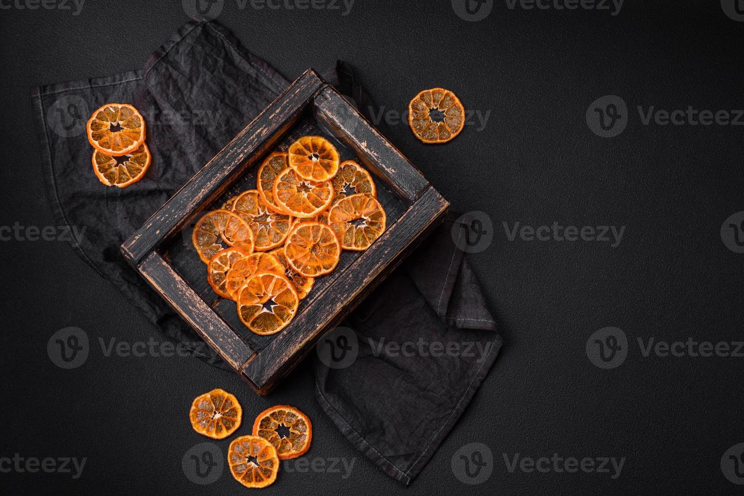 Beautiful Christmas decoration consisting of an old wooden box with dried citrus fruits photo