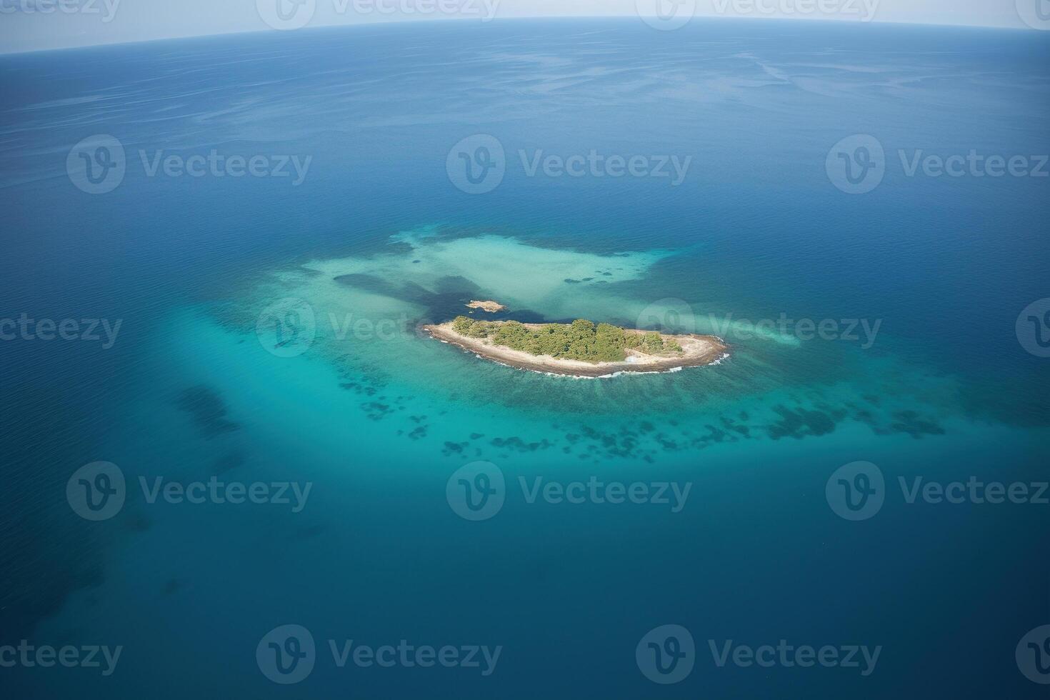 Aerial view of a small island in the middle of the ocean. photo