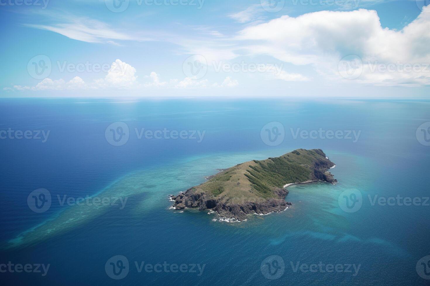 Aerial view of a small island in the middle of the ocean. photo