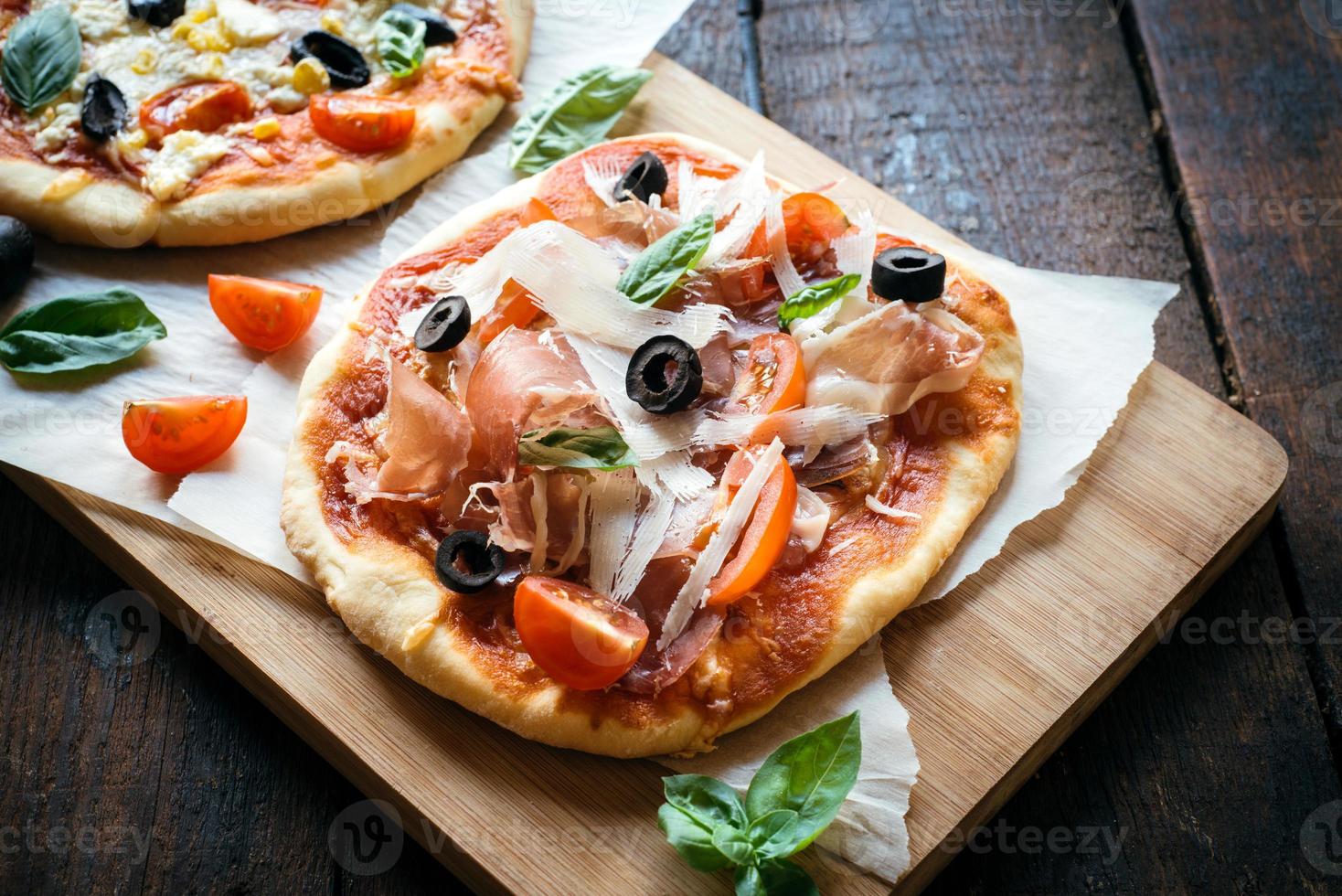 Served prosciutto mini pizza photo