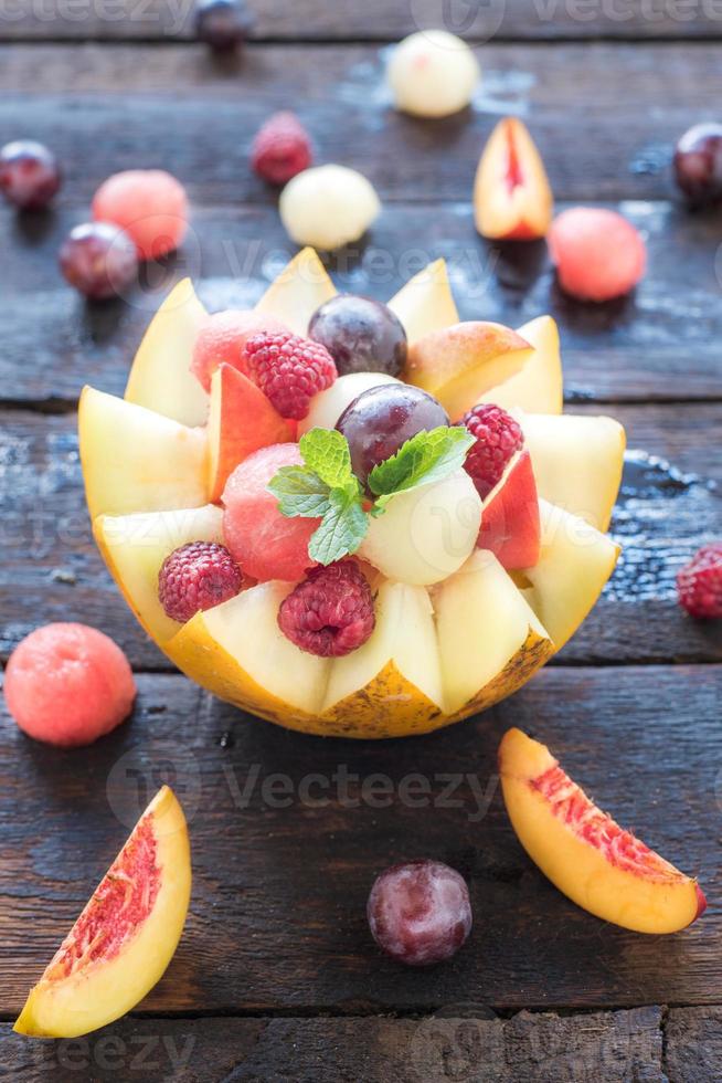 Fruit salad in melon photo