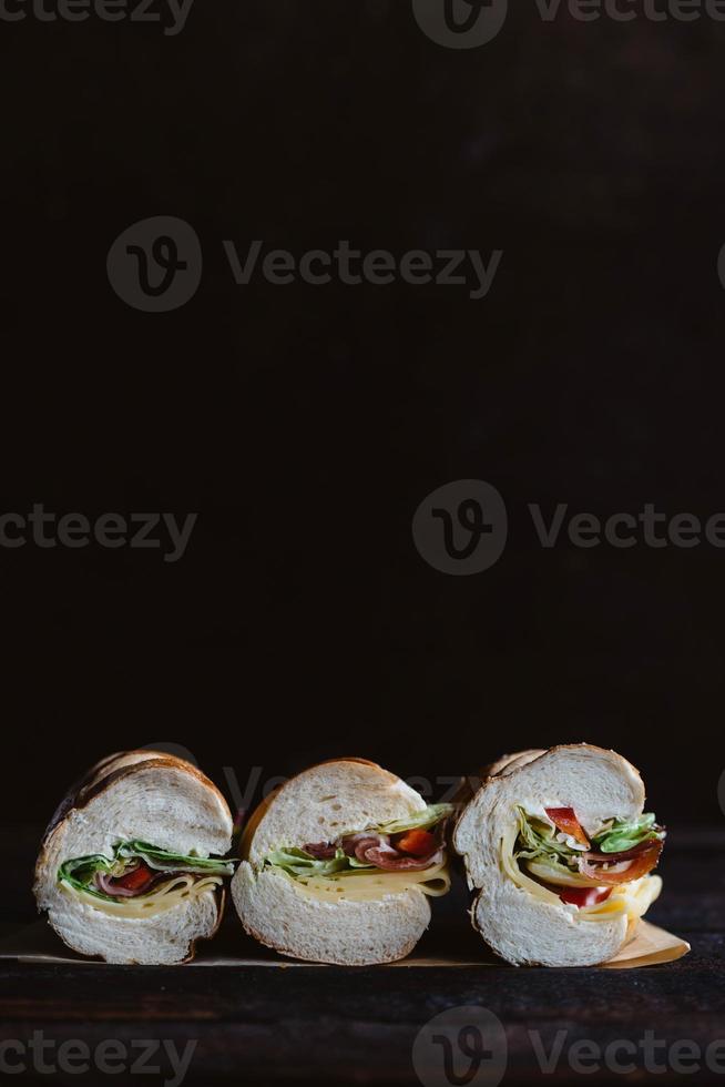 Sliced three sandwiches photo