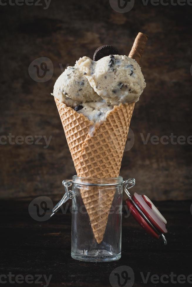 Ice cream with cookies in cone photo