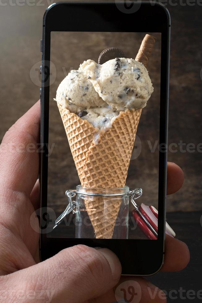 Ice cream with cookies in cone photographing photo