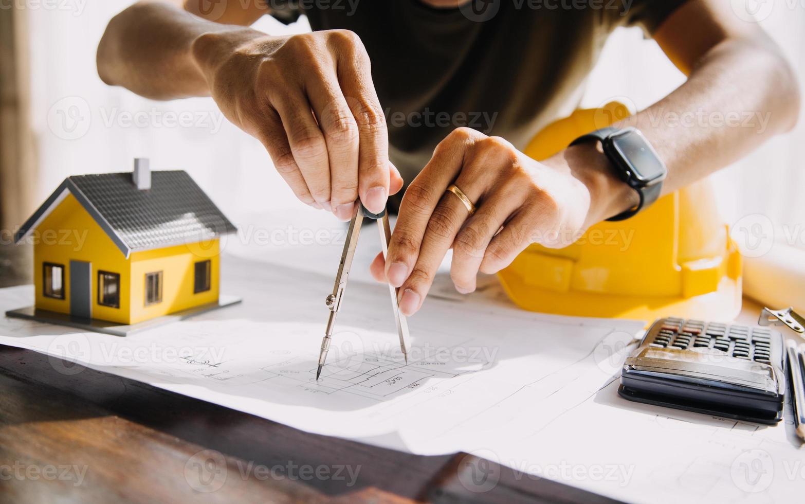 Architect concept, Architects working with blueprints in the office, Vintage Effect photo