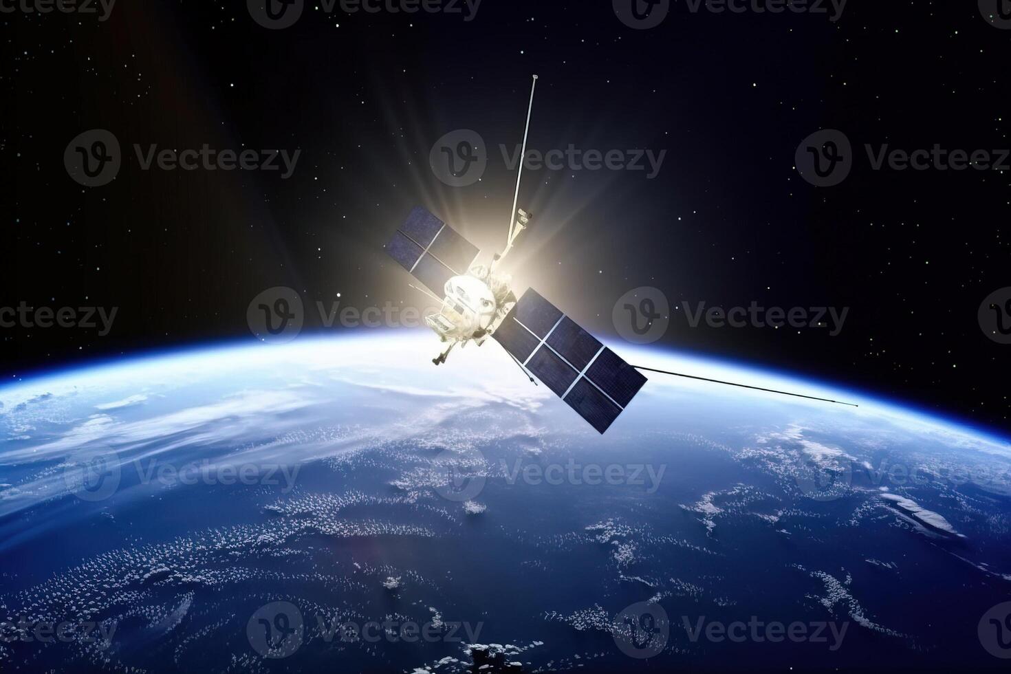 A satellite is flying in orbit around the planet Earth. Against the background of the planet and blue space in the rays of the sun. . photo