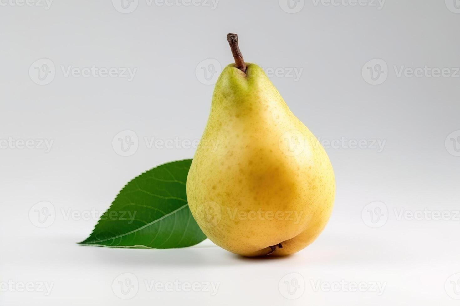 Ripe pear with a leaf, isolate on a white background. Macro studio shot. . photo