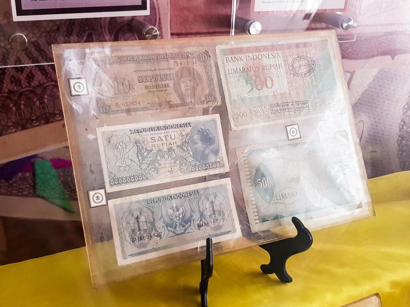 Riau, Indonesia in March 2019. The collection of rare banknote paper at the Riau Museum, namely rupiah notes with denominations of one, ten, one hundred, five hundred, one thousand, five thousand. photo