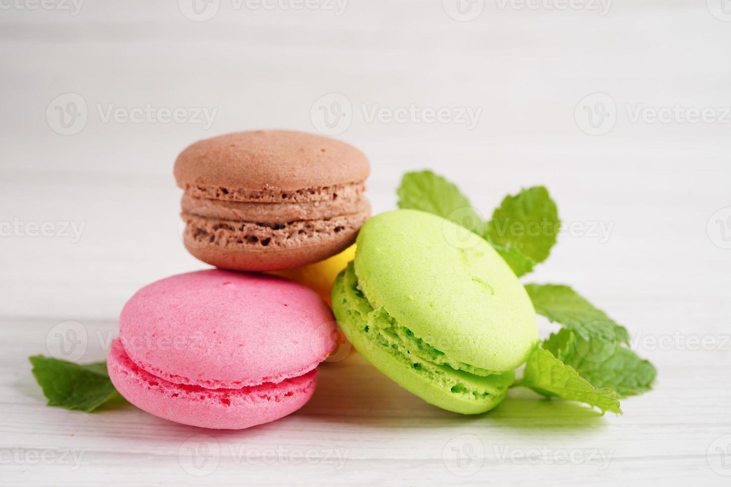 Macaron or french macaroon dessert, cake and cookies on the celebrated birthday. photo