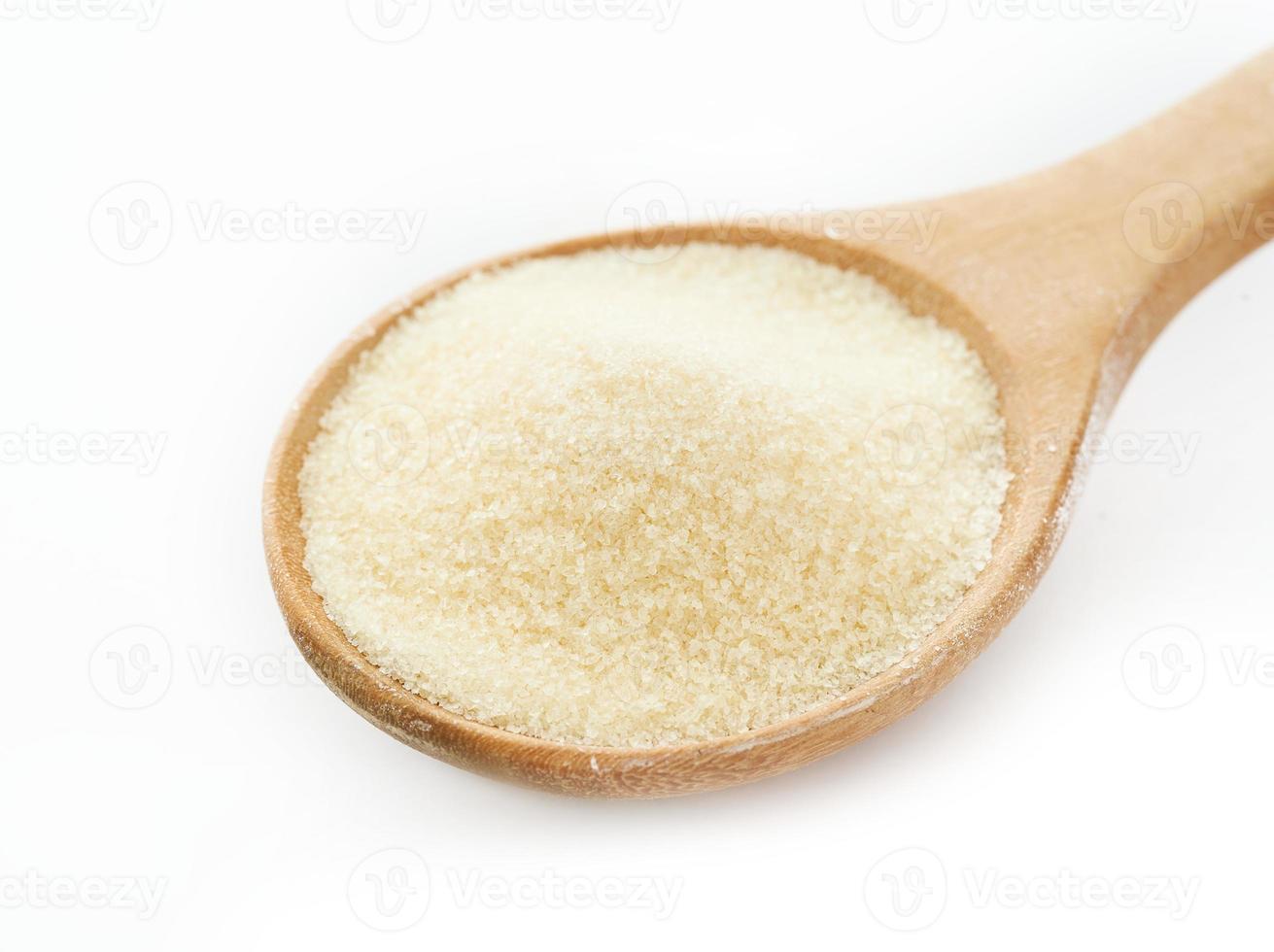 gelatin powder in wood spoon isolated on white background. pile of gelatin powder in wood spoon isolated. gelatin powder in wood spoon isolated photo