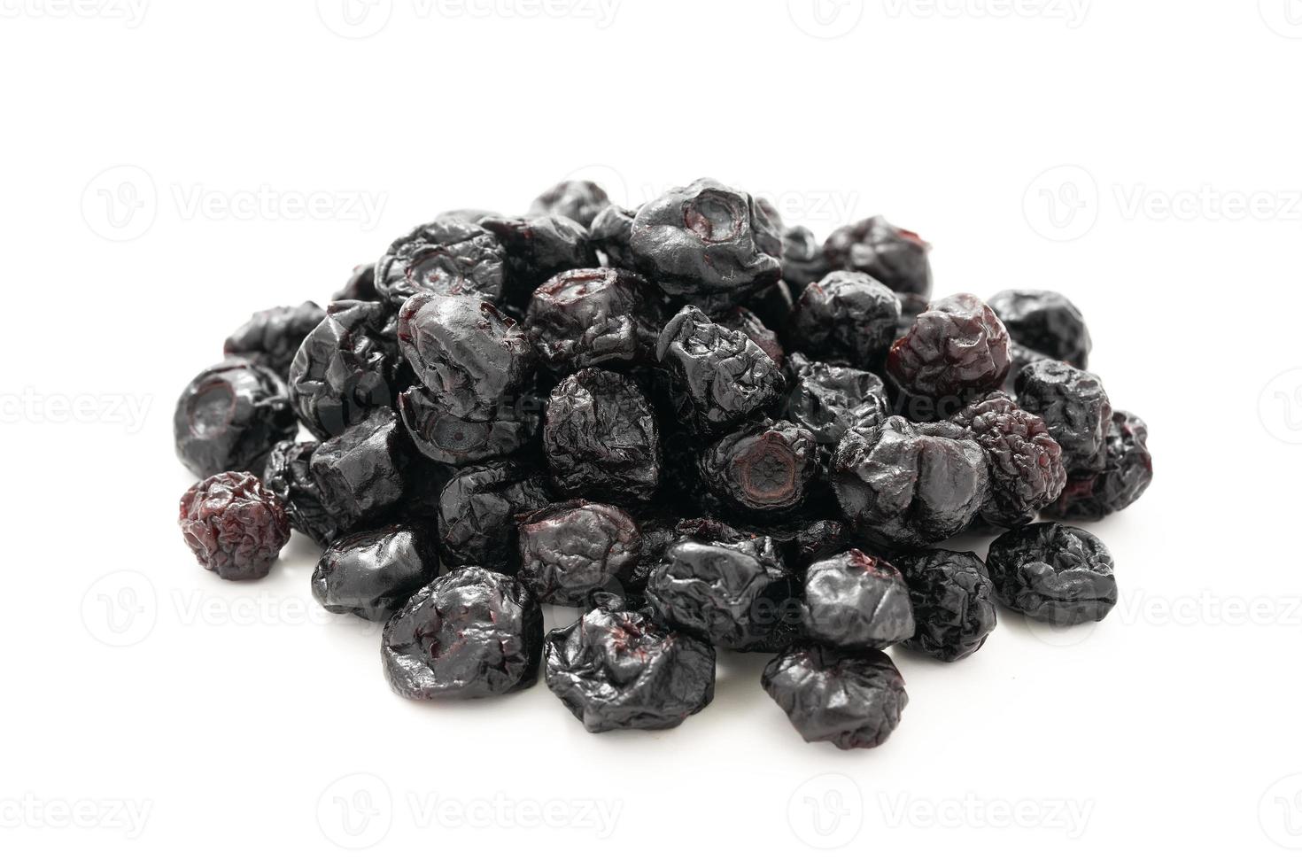 dry blueberry or blackberry isolated on white background. pile of dry blueberry or blackberry isolated. dry blueberry or blackberry isolated photo