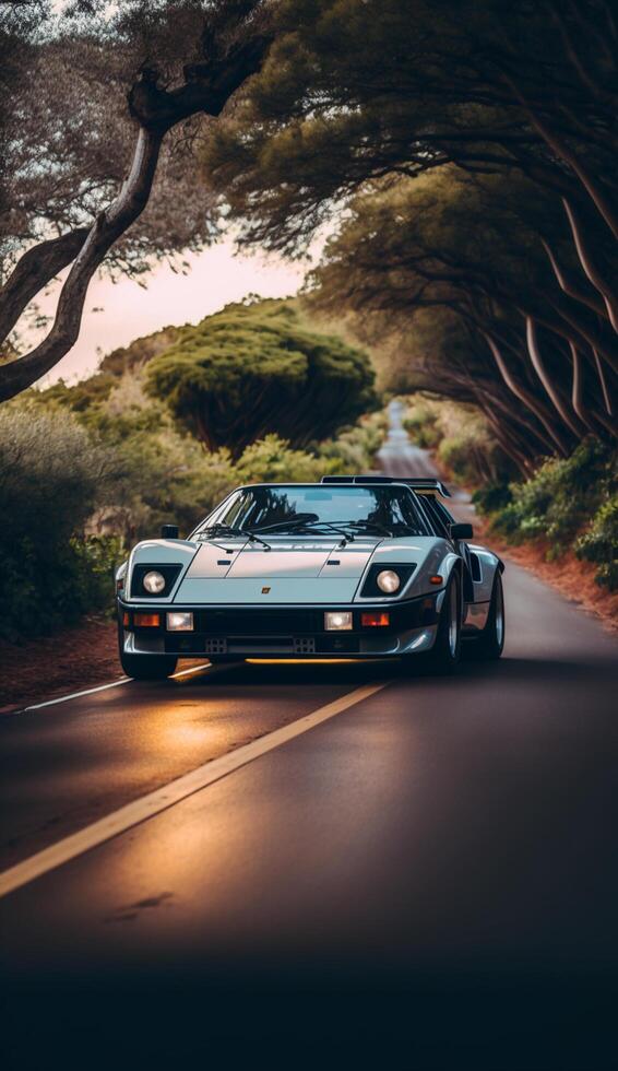 illustration of a sport car on a lonely road with a view of trees , photo