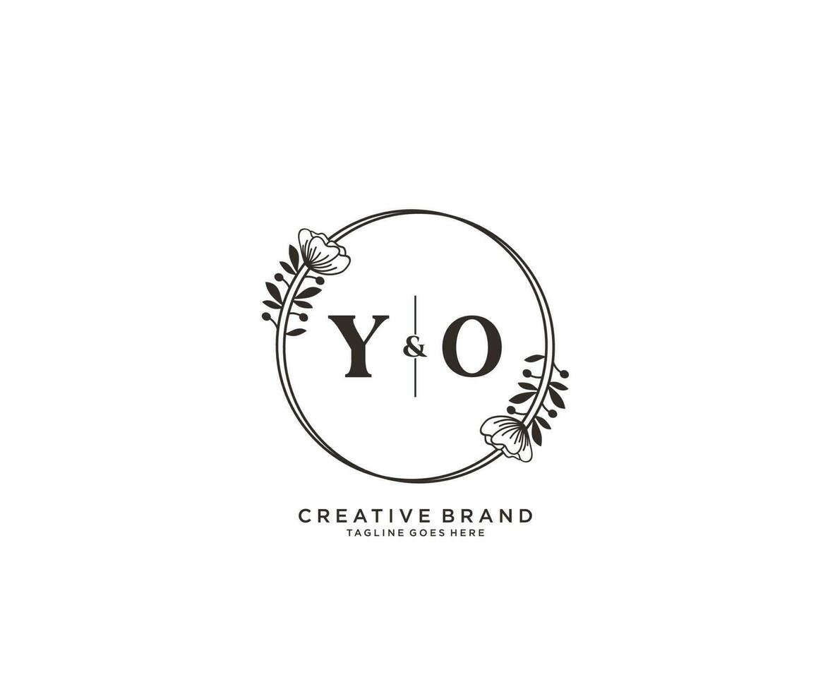 initial YO letters hand drawn feminine and floral botanical logo suitable for spa salon skin hair beauty boutique and cosmetic company. vector