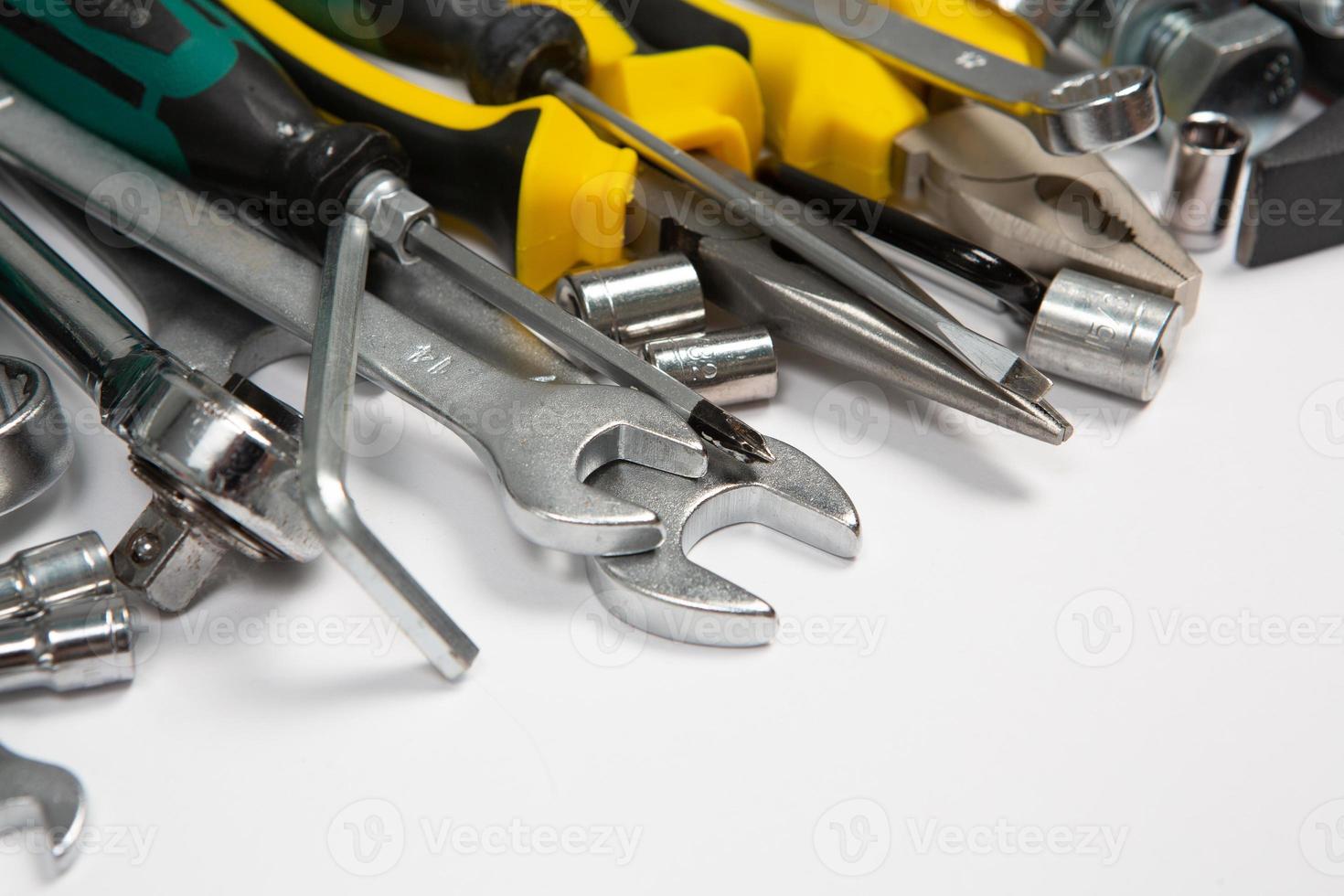 Set of tools for repair in a case on a white background. Assorted work or construction tools. Wrenches, Pliers, screwdriver. Top view photo