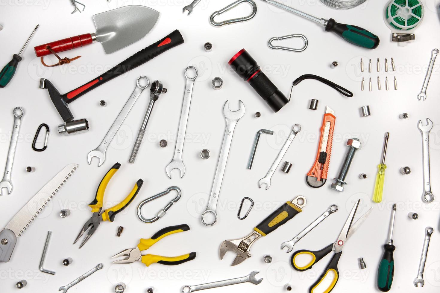 Set of tools for repair in a case on a white background. Assorted work or construction tools. Wrenches, Pliers, screwdriver. Top view photo