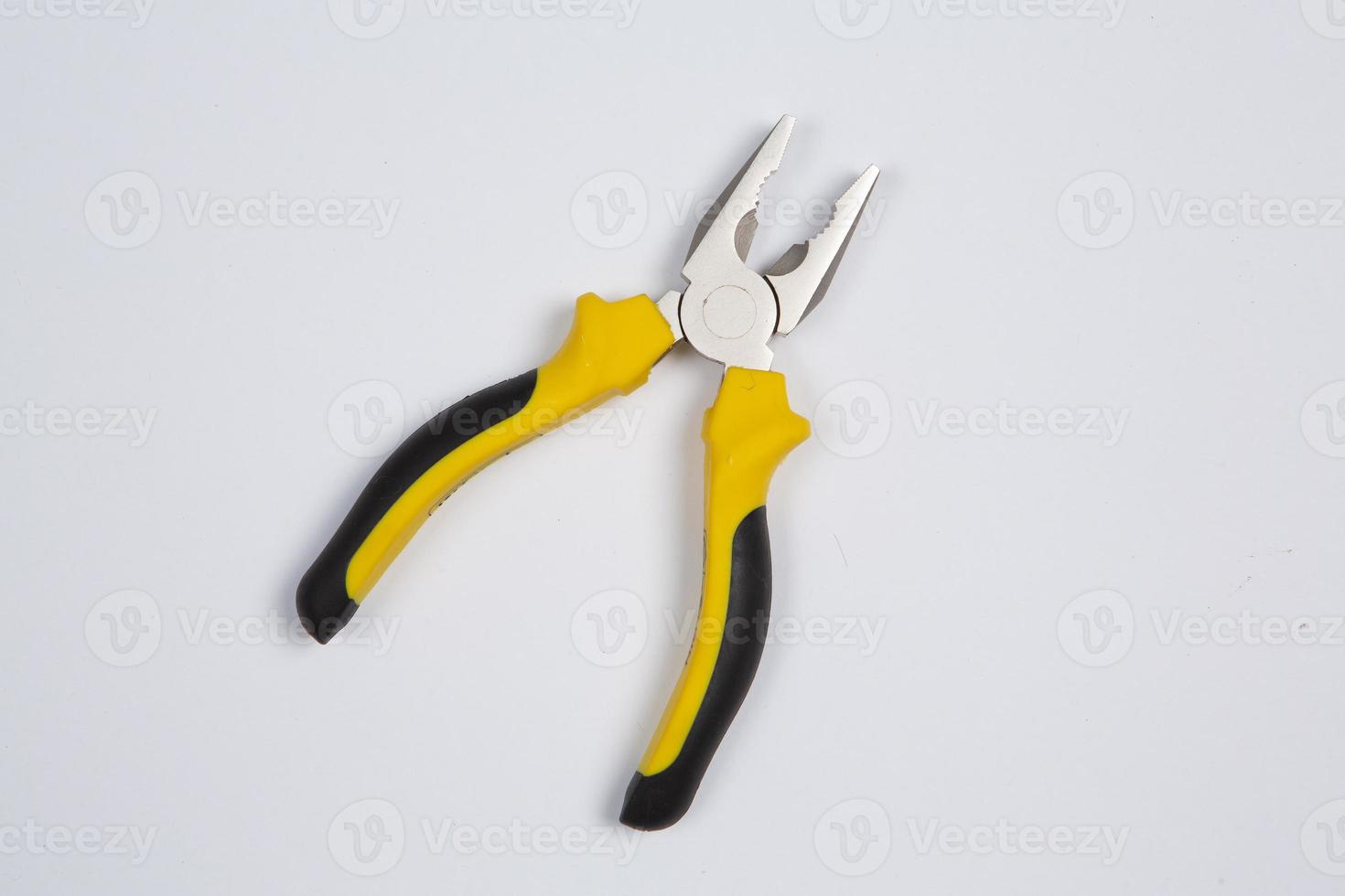 Set of tools for repair in a case on a white background. Assorted work or construction tools. Wrenches, Pliers, screwdriver. Top view photo