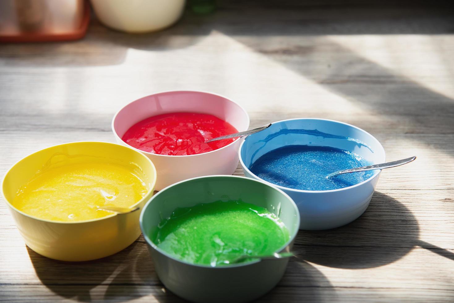 colorful jam jelly liquid for cake surface decoration, home bakery sweet dessert making concept photo
