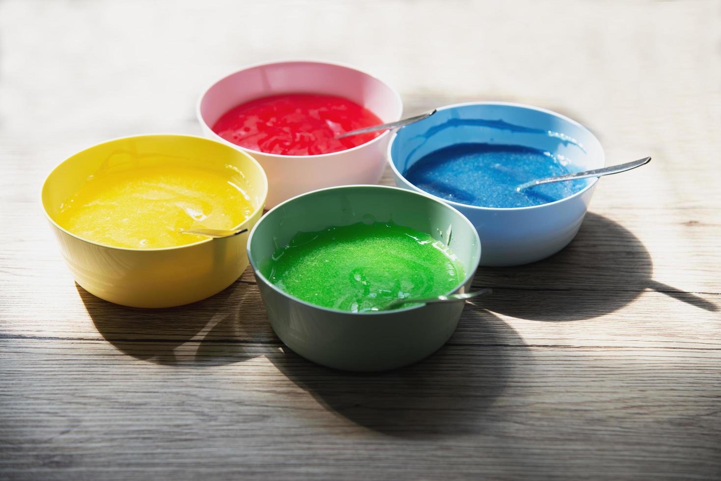 colorful jam jelly liquid for cake surface decoration, home bakery sweet dessert making concept photo