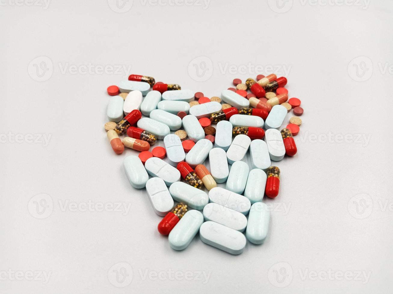 Assorted pharmaceutical medicine pills, tablets and capsules photo