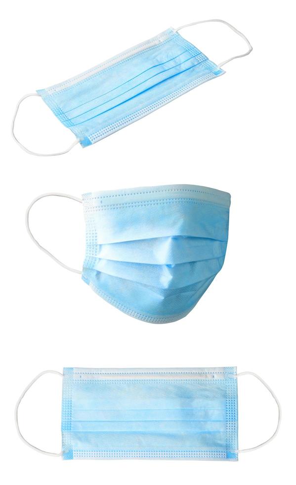 surgical or medical face mask to prevent corona virus protection isolated on white background with clipping path. blue doctor mask photo