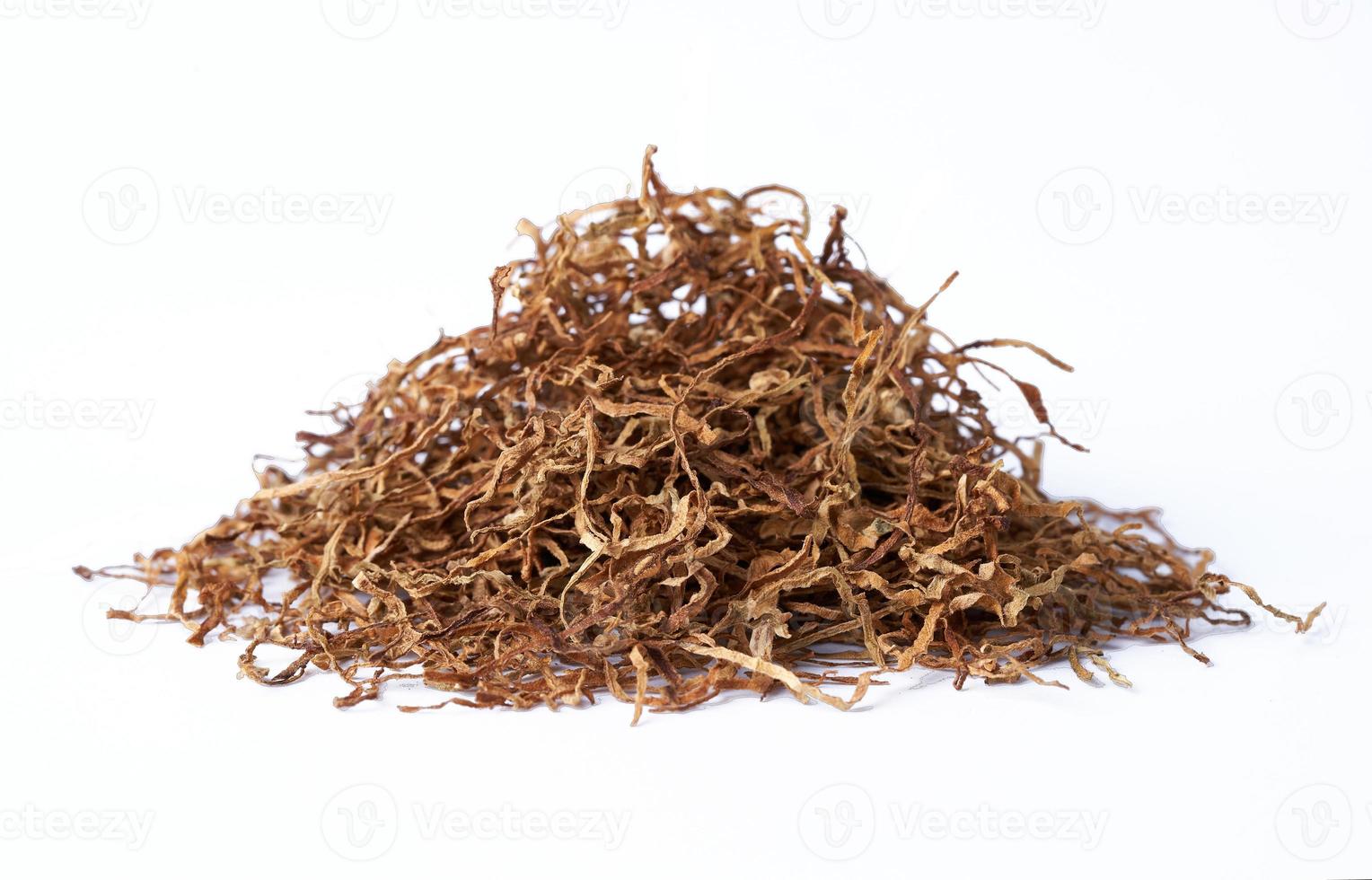 close up cut tobacco isolated on white background with clipping path photo