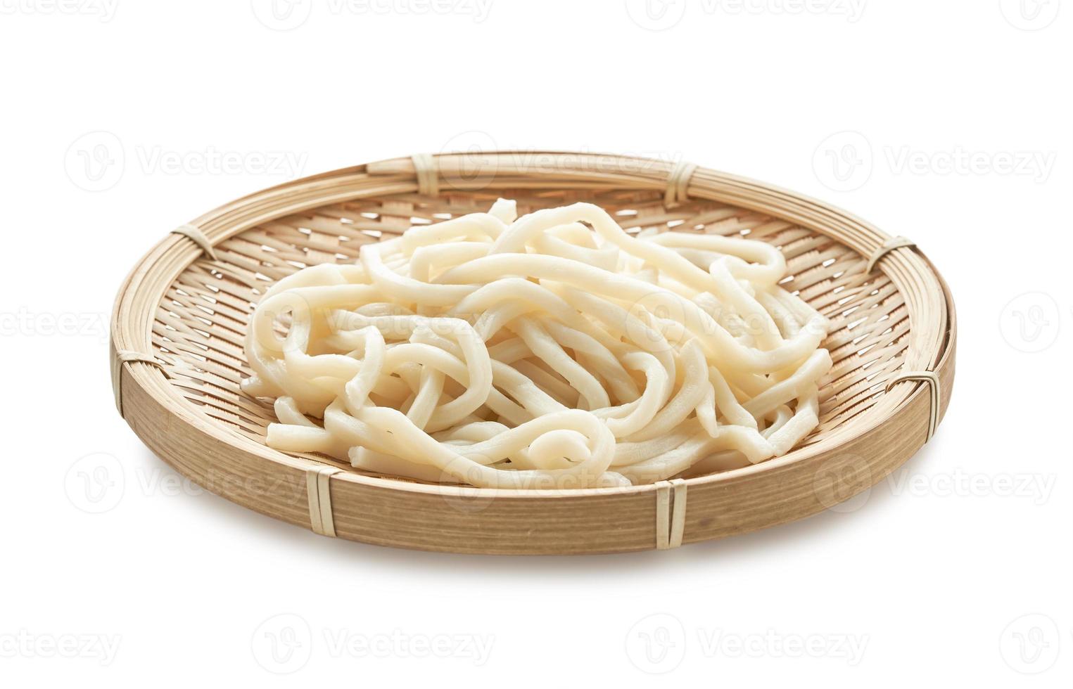 close up udon noodle in wood bowl isolated on white background with clipping path photo